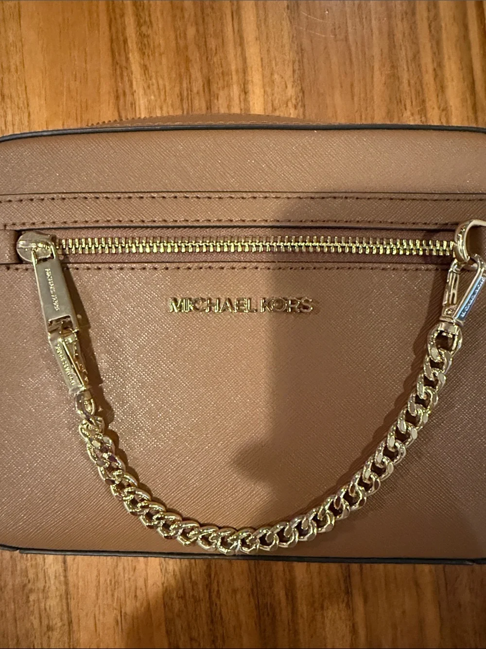 Michael Kors questions leave
